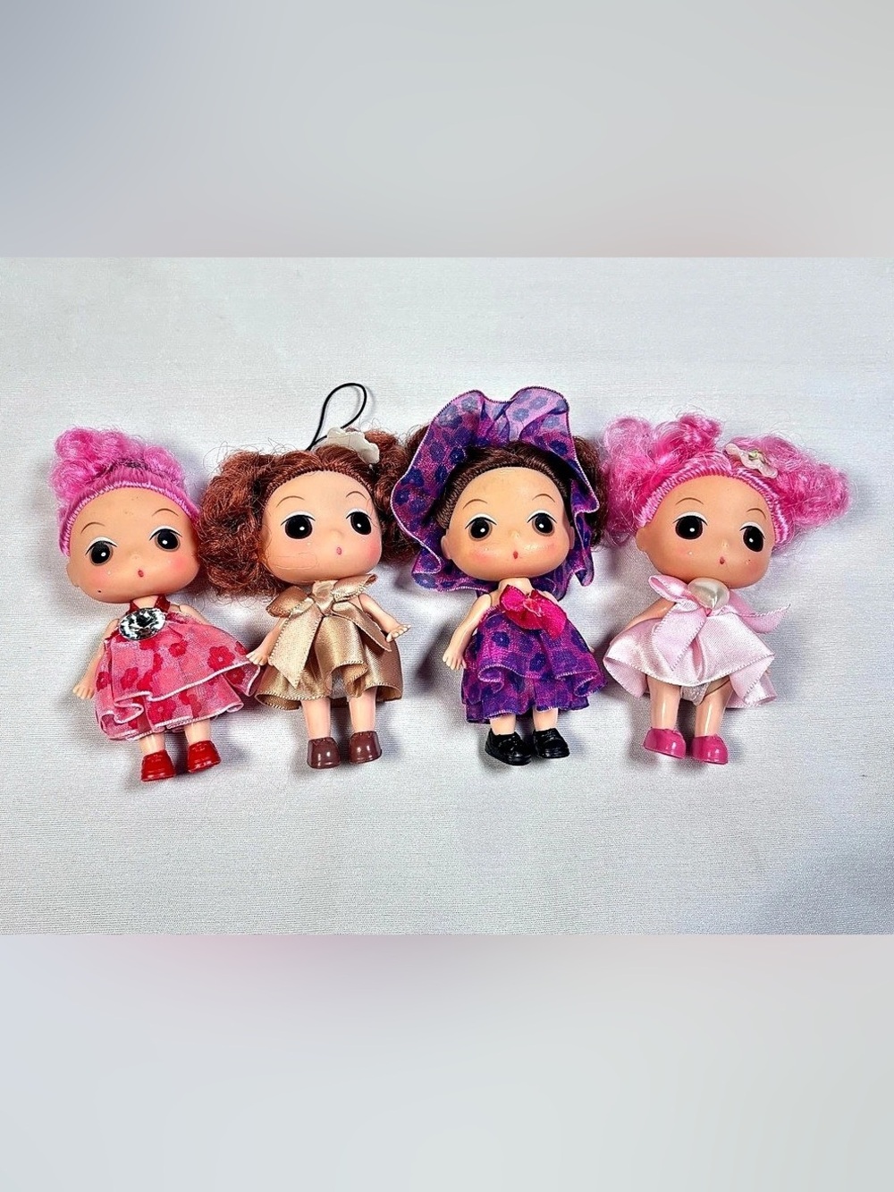 Lot of 4 Mini Ddung Inspired Big Eye Pocket Dolls